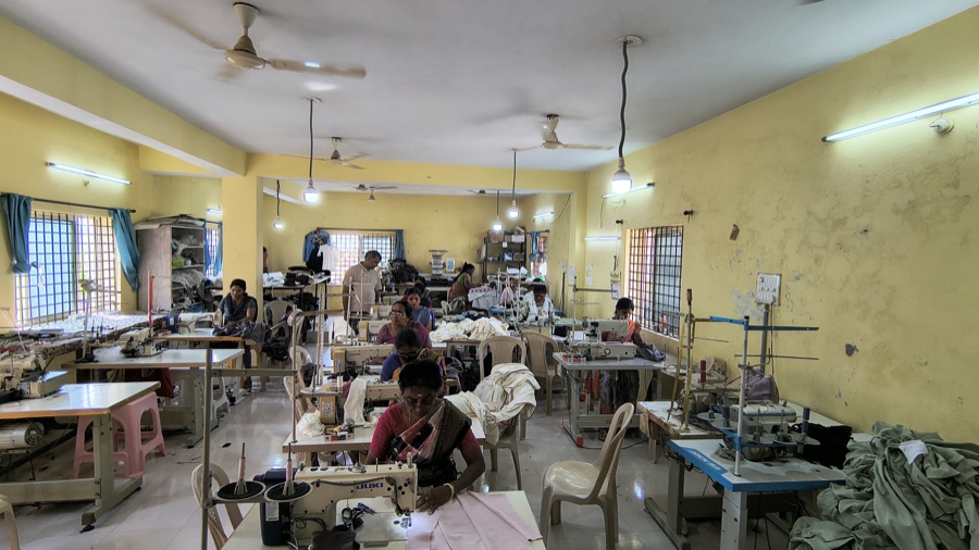 Asha Garment Factory — production floor with skilled craftspeople, Hyderabad