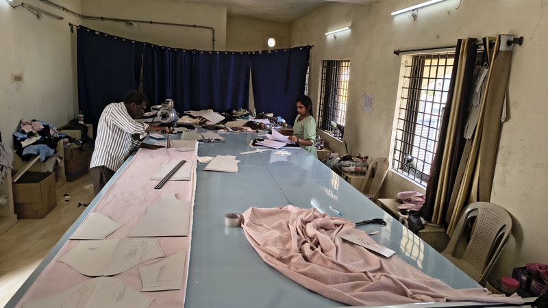 Pattern cutting and fabric layout at Asha Garment Factory